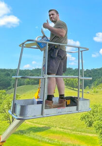 man on scissor lift